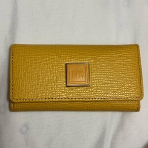 Yellow Nina Ricci key holder